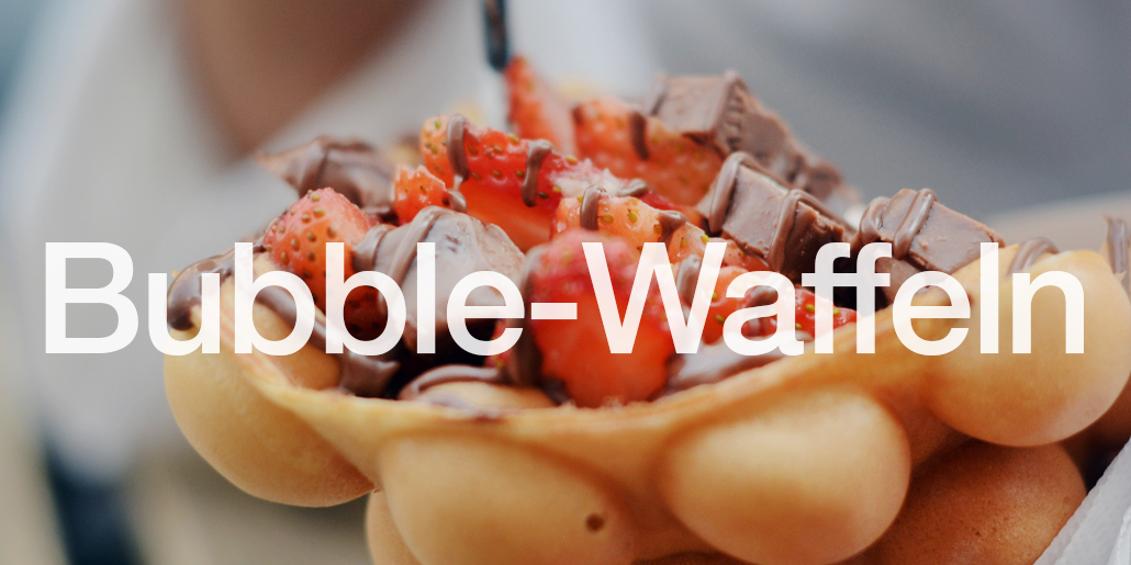 Bubble Waffel Catering mit Waffeln Schokoladensouce und Erdbeeren